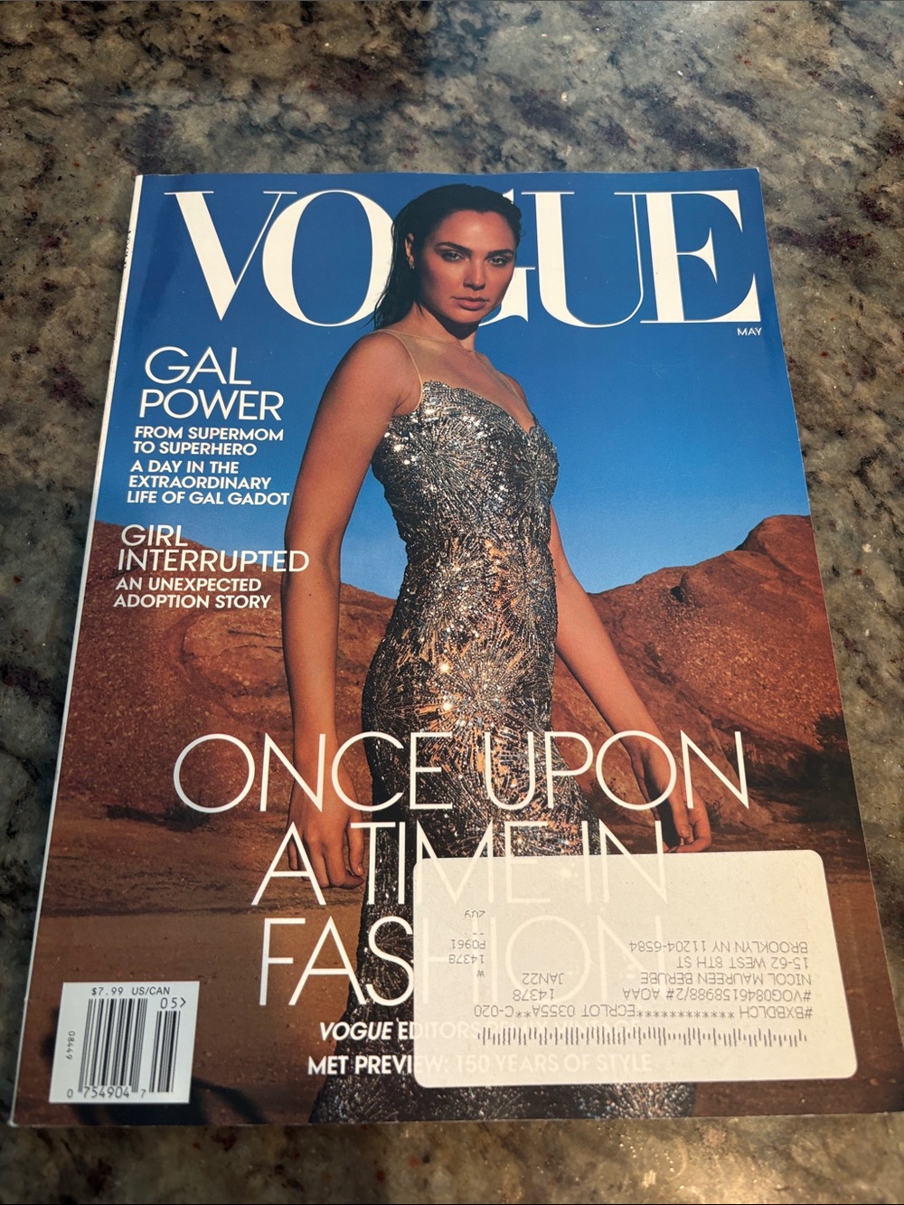 Vogue Cover — Metallic Silver Gown on Blue Backdrop